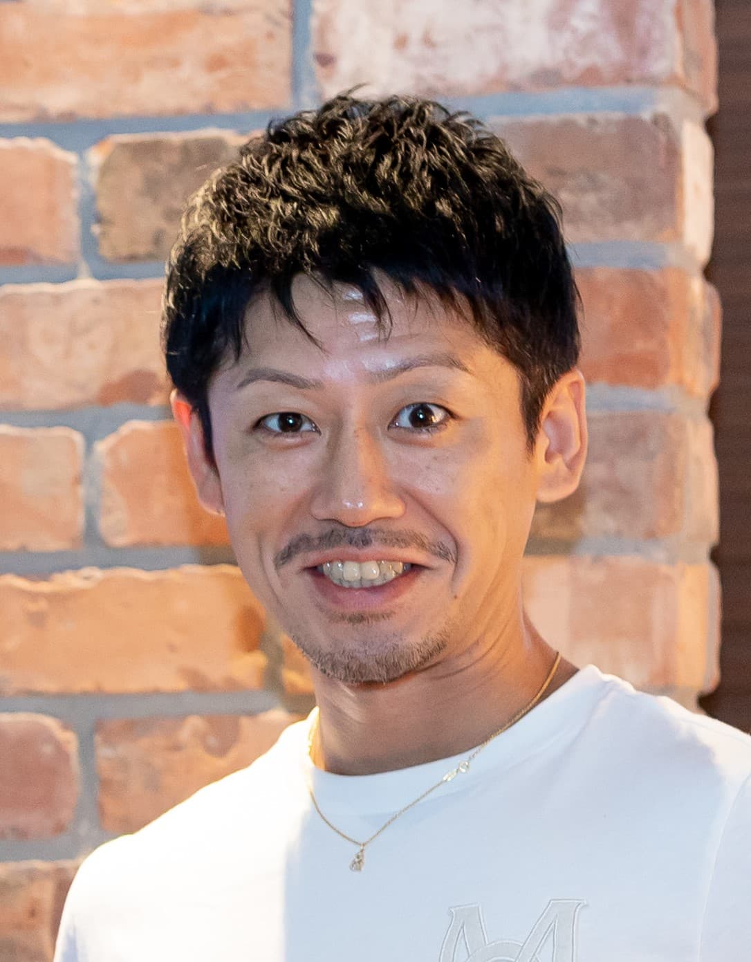 大塚  祐一