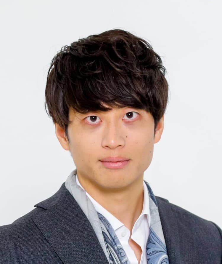 足立 卓也